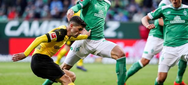 爱游戏官网入口-多特蒙德客场惊险逼平汉堡，德甲冠军积分领先